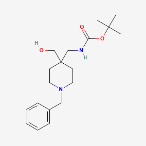 molecular formula C19H30N2O3 B1610419 tert-Butyl ((1-benzyl-4-(hydroxymethyl)piperidin-4-yl)methyl)carbamate CAS No. 493026-45-2