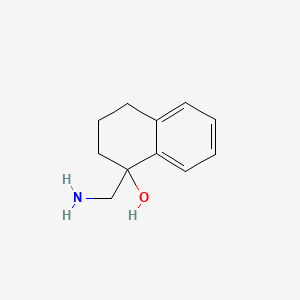 molecular formula C11H15NO B1610781 1-(Aminomethyl)-1,2,3,4-tetrahydronaphthalen-1-ol CAS No. 50361-60-9