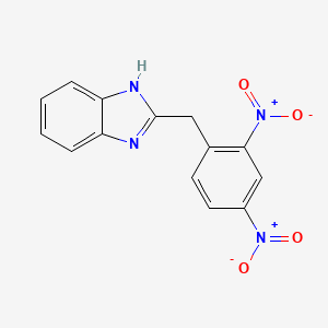 molecular formula C14H10N4O4 B1611129 2-(2,4-Dinitrobenzyl)-1H-benzo[d]imidazole CAS No. 60059-85-0