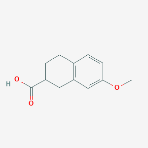 molecular formula C12H14O3 B1611345 7-Methoxy-1,2,3,4-tetrahydronaphthalene-2-carboxylic acid CAS No. 24833-31-6
