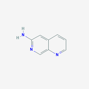 molecular formula C8H7N3 B1612697 1,7-萘啶-6-胺 CAS No. 5912-36-7