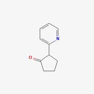 molecular formula C10H11NO B1621398 2-(Pyridin-2-yl)cyclopentan-1-one CAS No. 28885-25-8