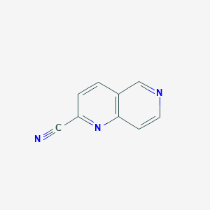 molecular formula C9H5N3 B1623057 1,6-Naphthyridine-2-carbonitrile CAS No. 852930-87-1