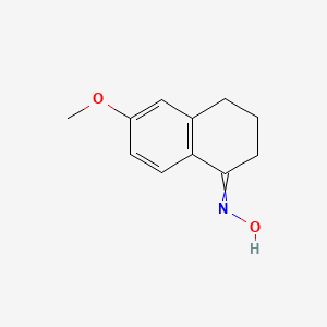 B1623458 6-Methoxy-1-tetralone oxime CAS No. 54951-36-9