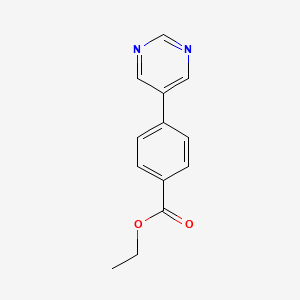 molecular formula C13H12N2O2 B1625638 Ethyl 4-(pyrimidin-5-yl)benzoate CAS No. 82525-18-6