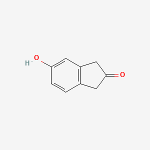 molecular formula C9H8O2 B1626053 5-Hydroxy-indan-2-one CAS No. 52727-23-8