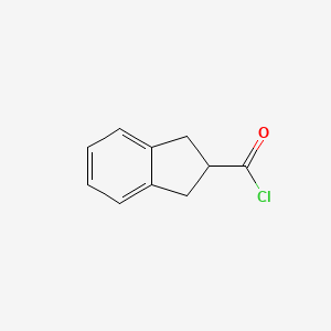 molecular formula C10H9ClO B1629484 2,3-二氢-1H-茚满-2-酰氯 CAS No. 54672-55-8
