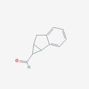 B163620 1,1A,6,6a-tetrahydrocyclopropa[a]indene-1-carbaldehyde CAS No. 133696-70-5