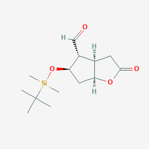 B163712 (3aR,4R,5R,6aS)-5-(tert-butyldimethylsilyloxy)-2-oxohexahydro-2H-cyclopenta[b]furan-4-carbaldehyde CAS No. 64091-14-1