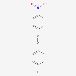 molecular formula C14H8FNO2 B1640693 1-Fluoro-4-(2-(4-nitrophenyl)ethylnyl)benzene 