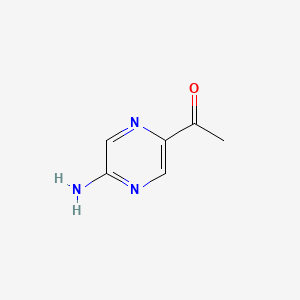 molecular formula C6H7N3O B1645393 1-(5-Aminopyrazin-2-yl)ethanone 