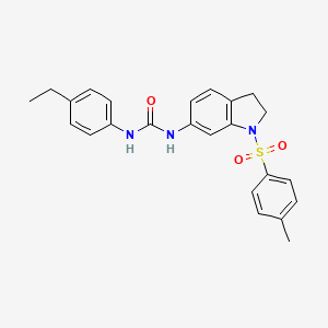 3-(4-Fluorophenyl)-5-{[4-(2,4,5-trimethylphenyl)-1,3-thiazol-2-yl]methyl}-1,2,4-oxadiazole