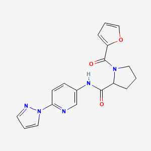 molecular formula C18H17N5O3 B1651050 1-(furan-2-carbonyl)-N-[6-(1H-pyrazol-1-yl)pyridin-3-yl]pyrrolidine-2-carboxamide CAS No. 1219398-52-3