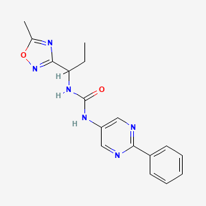 molecular formula C17H18N6O2 B1652334 3-[1-(5-Methyl-1,2,4-oxadiazol-3-yl)propyl]-1-(2-phenylpyrimidin-5-yl)urea CAS No. 1424386-57-1