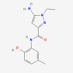 molecular formula C13H16N4O2 B1653514 5-amino-1-ethyl-N-(2-hydroxy-5-methylphenyl)-1H-pyrazole-3-carboxamide CAS No. 1856030-12-0
