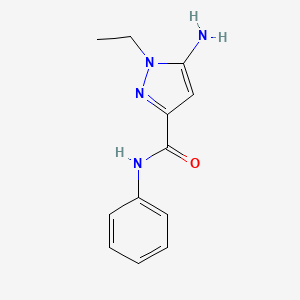 molecular formula C12H14N4O B1653573 5-amino-1-ethyl-N-phenyl-1H-pyrazole-3-carboxamide CAS No. 1856092-80-2