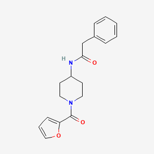 molecular formula C18H20N2O3 B1655998 N-[1-(furan-2-carbonyl)piperidin-4-yl]-2-phenylacetamide CAS No. 4759-64-2