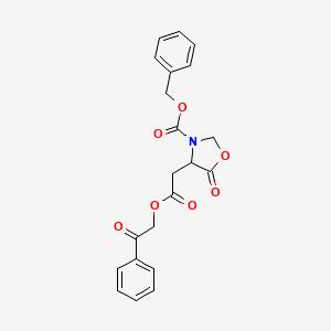 B1656952 Benzyl 5-oxo-4-(2-oxo-2-phenacyloxyethyl)-1,3-oxazolidine-3-carboxylate CAS No. 5486-26-0