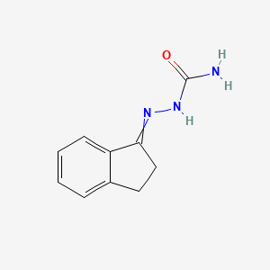 molecular formula C10H11N3O B1660319 (2,3-Dihydroinden-1-ylideneamino)urea CAS No. 7461-24-7