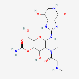 molecular formula C17H29N7O8 B1664224 [4-Hydroxy-2-(hydroxymethyl)-6-[(7-hydroxy-4-oxo-1,3a,5,6,7,7a-hexahydroimidazo[4,5-c]pyridin-2-yl)amino]-5-[methyl-[2-(methylamino)acetyl]amino]oxan-3-yl] carbamate CAS No. 38621-52-2