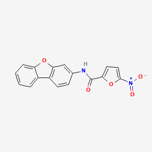 B1668179 N-dibenzofuran-3-yl-5-nitrofuran-2-carboxamide CAS No. 329198-87-0