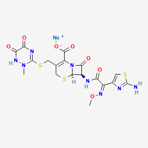 molecular formula C18H16N8Na2O7S3 B1668364 二钠；(6R,7R)-7-[[(2E)-2-(2-氨基-1,3-噻唑-4-基)-2-甲氧基亚氨基乙酰]氨基]-3-[(2-甲基-6-氧化-5-氧代-1,2,4-三嗪-3-基)硫代甲基]-8-氧代-5-噻-1-氮杂双环[4.2.0]辛-2-烯-2-羧酸盐 CAS No. 74578-69-1