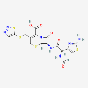 molecular formula C16H15N7O5S4 B1668493 (6R,7R)-7-[[2-(2-氨基-1,3-噻唑-4-基)-2-甲酰基氨基乙酰]氨基]-8-氧代-3-(噻二唑-5-基硫代甲基)-5-噻-1-氮杂双环[4.2.0]辛-2-烯-2-羧酸 CAS No. 94714-78-0