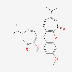 B1672821 2,4,6-Cycloheptatrien-1-one, 3,3'-((4-methoxyphenyl)methylene)bis(2-hydroxy-6-(1-methylethyl)- CAS No. 92832-17-2