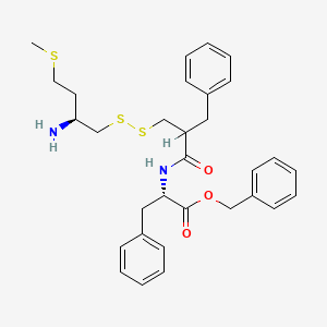 B1678842 benzyl (2S)-2-[[2-[[[(2S)-2-amino-4-methylsulfanylbutyl]disulfanyl]methyl]-3-phenylpropanoyl]amino]-3-phenylpropanoate CAS No. 135949-60-9