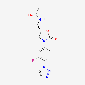 B1678923 Acetamide, N-(((5S)-3-(3-fluoro-4-(1H-1,2,3-triazol-1-yl)phenyl)-2-oxo-5-oxazolidinyl)methyl)- CAS No. 181996-82-7