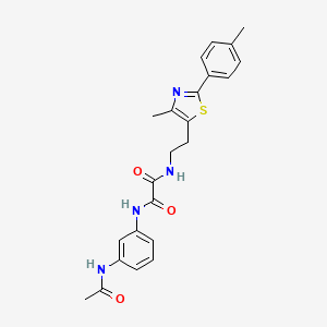 B1680381 N1-(3-acetamidophenyl)-N2-(2-(4-methyl-2-(p-tolyl)thiazol-5-yl)ethyl)oxalamide CAS No. 897613-29-5