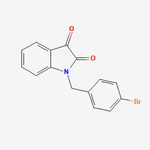 B1683070 1-[(4-Bromophenyl)methyl]indole-2,3-dione CAS No. 79183-37-2