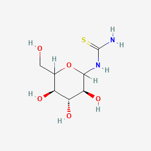 molecular formula C7H14N2O5S B1683743 Urea, 1-(L-glucosyl)-2-thio- CAS No. 64044-06-0