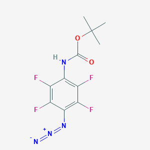 molecular formula C11H10F4N4O2 B016884 4-(N-Tert-butoxycarbonylamino)tétrafluorophénylazide CAS No. 294187-76-1