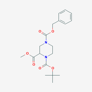 molecular formula C19H26N2O6 B169491 4-苄基-1-叔丁基-2-甲基哌嗪-1,2,4-三羧酸酯 CAS No. 129799-14-0