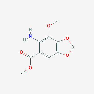 molecular formula C10H11NO5 B169657 Methyl 6-amino-7-methoxy-2H-1,3-benzodioxole-5-carboxylate CAS No. 109893-05-2