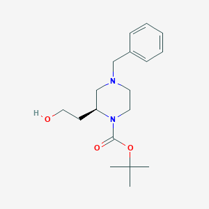molecular formula C18H28N2O3 B170415 tert-butyl (2S)-4-benzyl-2-(2-hydroxyethyl)piperazine-1-carboxylate CAS No. 169447-92-1