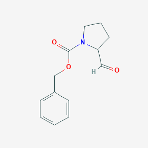 molecular formula C13H15NO3 B172982 苯甲基 2-甲酰基吡咯烷-1-羧酸酯 CAS No. 105706-84-1