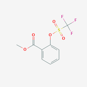 molecular formula C9H7F3O5S B173372 Benzoic acid, 2-[[(trifluoromethyl)sulfonyl]oxy]-, methyl ester CAS No. 17763-70-1
