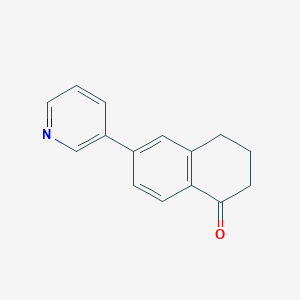 molecular formula C15H13NO B176753 6-(pyridin-3-yl)-3,4-dihydronaphthalen-1(2H)-one CAS No. 169192-56-7