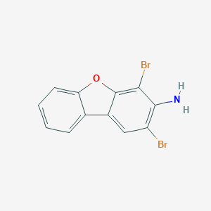 molecular formula C12H7Br2NO B178033 2,4-Dibromodibenzo[b,d]furan-3-amine CAS No. 133953-35-2