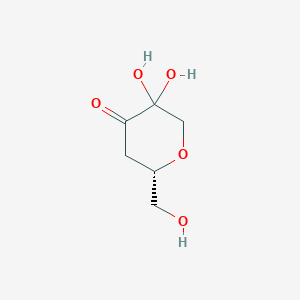 molecular formula C6H10O5 B179878 (2S)-5,5-dihydroxy-2-(hydroxymethyl)oxan-4-one CAS No. 150943-97-8