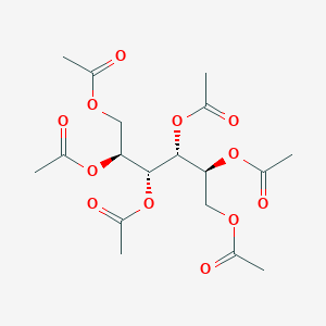 molecular formula C18H26O12 B019715 L-艾利糖六乙酸酯 CAS No. 13443-46-4