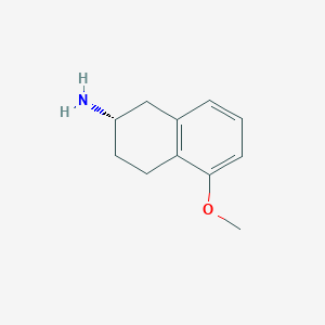 molecular formula C11H15NO B020052 (S)-5-甲氧基-2-氨基茚满 CAS No. 105086-80-4