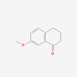 molecular formula C11H12O2 B020472 7-Methoxy-1-tetralone CAS No. 6836-19-7
