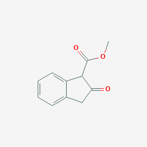 molecular formula C11H10O3 B020747 2-氧代-1-茚满甲酸甲酯 CAS No. 104620-34-0