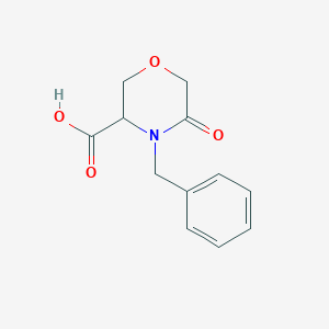 molecular formula C12H13NO4 B021023 4-Benzyl-5-oxomorpholine-3-carboxylic acid CAS No. 106910-79-6