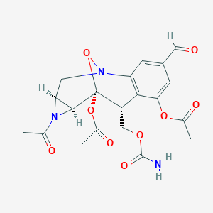 molecular formula C20H21N3O9 B219287 3,9-Epoxy-3H-azirino(2,3-c)benzazocine-5-carboxaldehyde, 1-acetyl-7,9-bis(acetyloxy)-8-(((aminocarbonyl)oxy)methyl)-1,1a,2,8,9,9a-hexahydro-, (1aS,3S,8R,9S,9aS)- CAS No. 114580-45-9