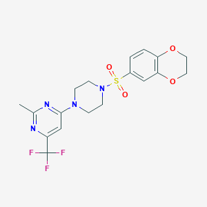 molecular formula C18H19F3N4O4S B2354455 4-[4-(2,3-Dihydro-1,4-benzodioxine-6-sulfonyl)piperazin-1-yl]-2-methyl-6-(trifluoromethyl)pyrimidine CAS No. 2097929-02-5