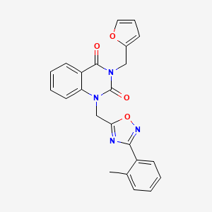 molecular formula C23H18N4O4 B2355300 3-(2-furylmethyl)-1-{[3-(2-methylphenyl)-1,2,4-oxadiazol-5-yl]methyl}quinazoline-2,4(1H,3H)-dione CAS No. 1207033-69-9